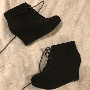 black high heeled booties
